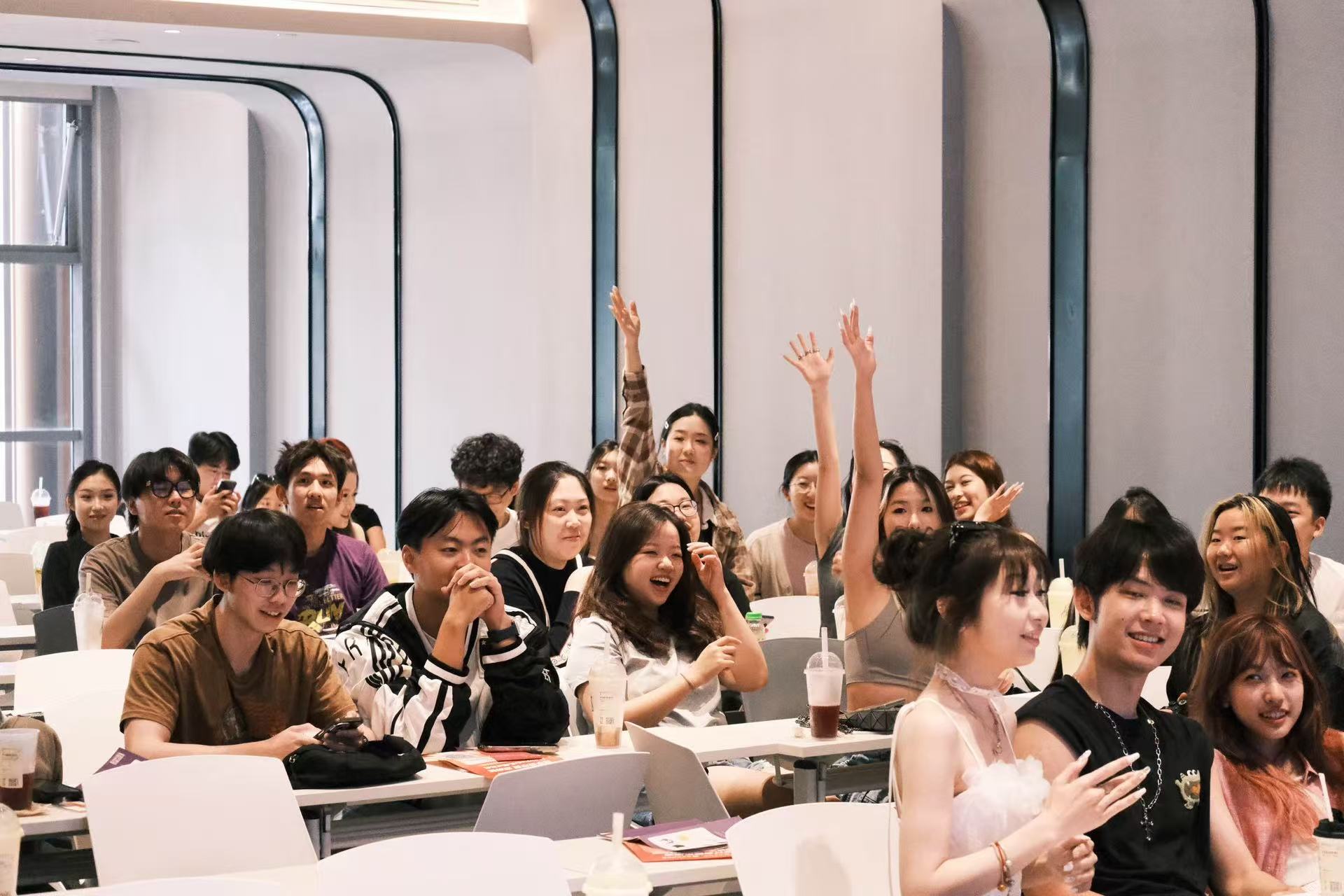 NYU BIA open house audience raising hands